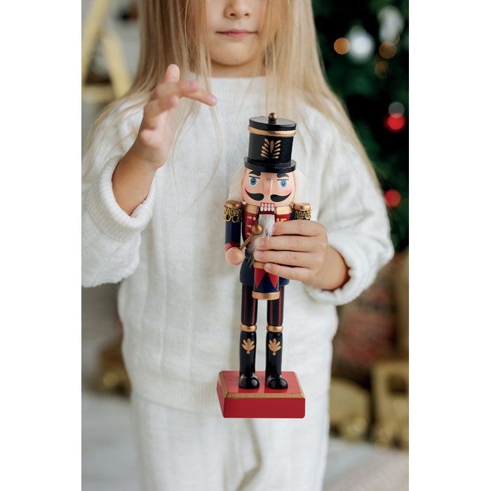 CX1551-04Jolly Crunch Nussknacker-Figur_ blau