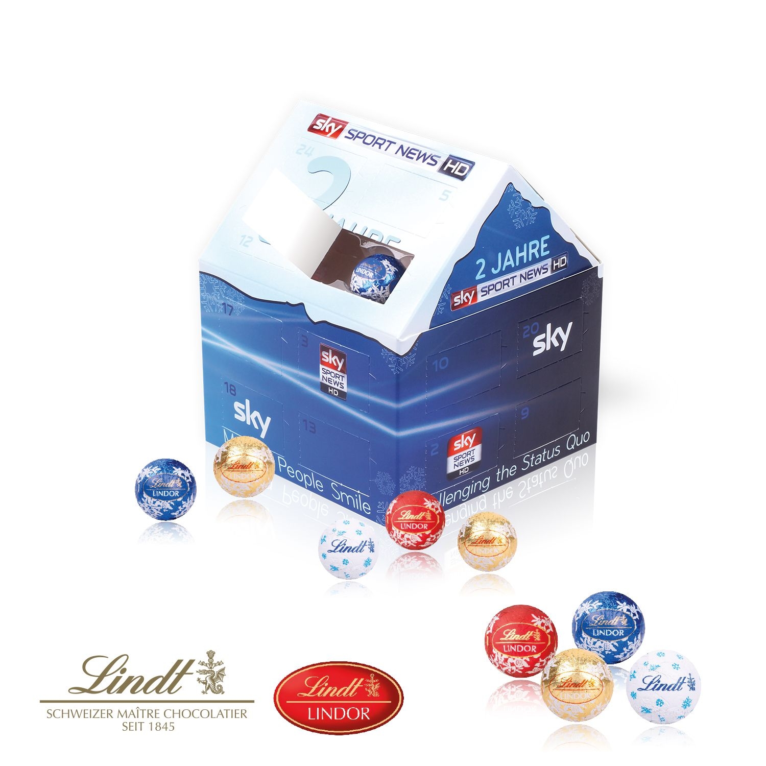 CD95335Adventskalender _Weihnachtshaus_ Classic mit Lindt Schokolade