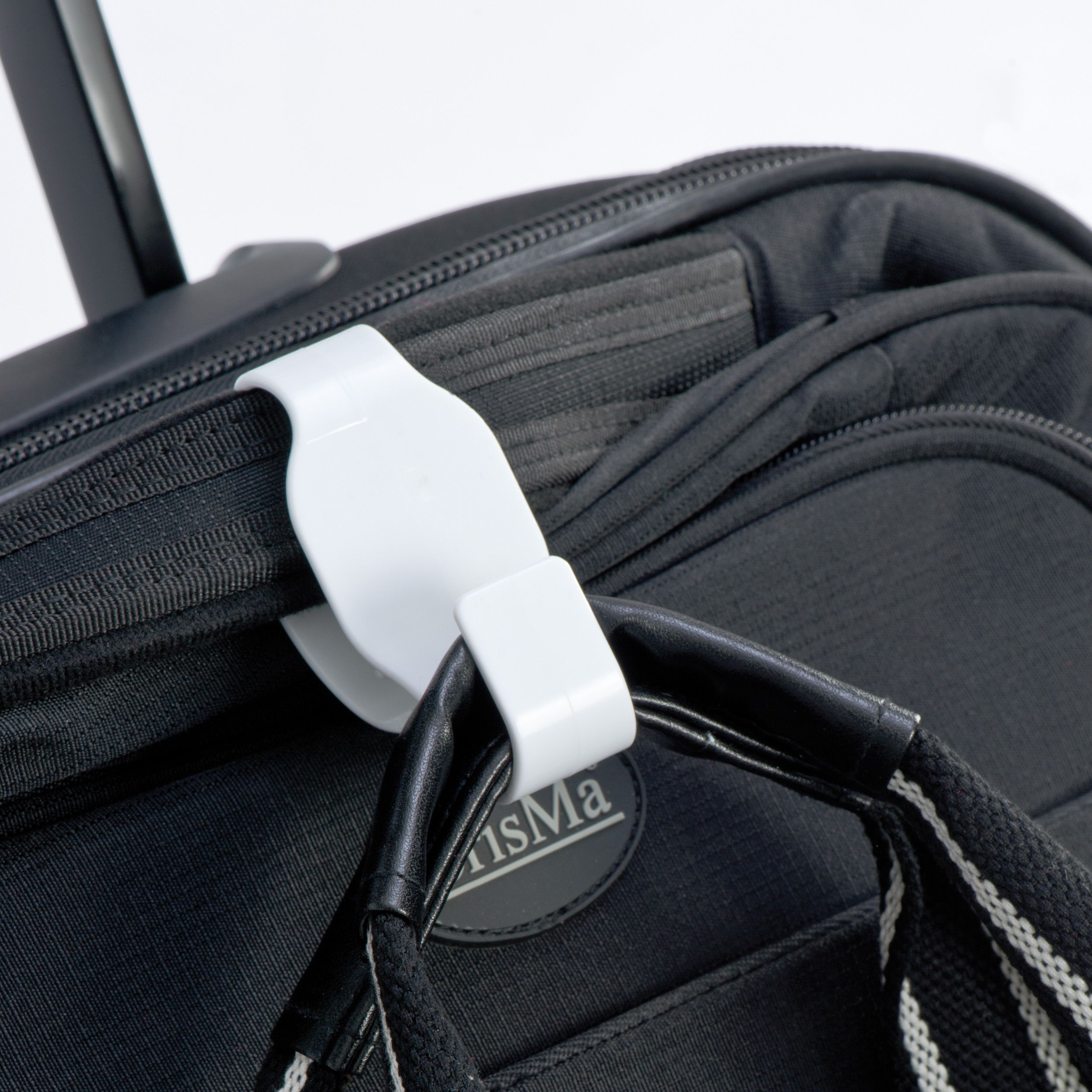 MA61769-06Taschenhalter aus Kunststoff fuer Trolleys_ weiss